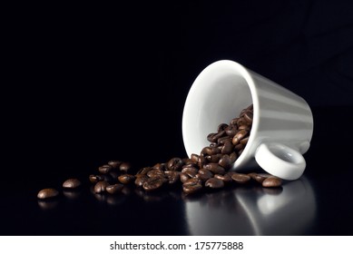 vintage coffee cup with natural beans - Powered by Shutterstock