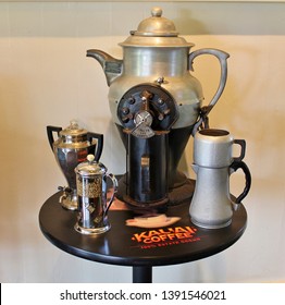 A Vintage Coffee Pot And Containers Displayed On A Table Top At The Kauai Coffee Company Estate