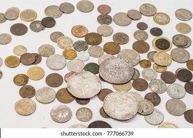 Vintage Collectible Coins On A White Background.