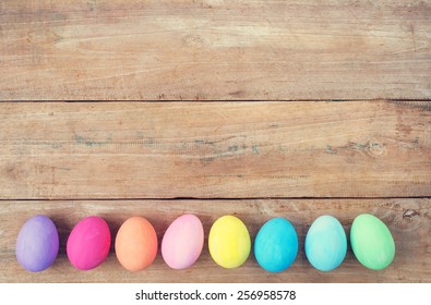 Vintage Colorful Easter Eggs On Wood Table Background