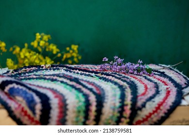 Vintage Colorful Handmade Rug And Spring Flowers. Country Life,cottage Core, Creative Rustic Patchwork Concept. Copy Space.