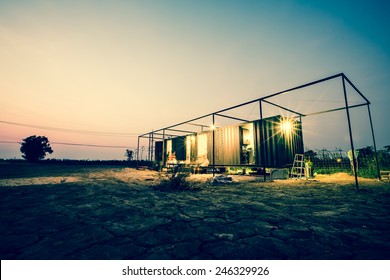 Vintage Of Container Cabin Home With Twilight Sky. Retro Filter.