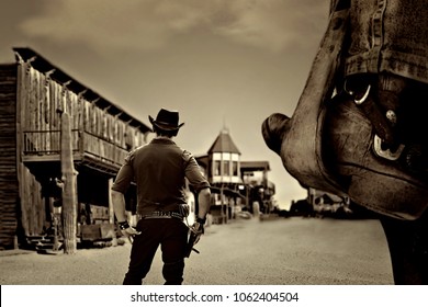 vintage cowboy in old wild far west ghost town