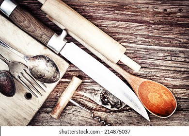 Vintage Cutlery On Rustic Wooden Background/ Vintage Kitchen Utensils For Cooking