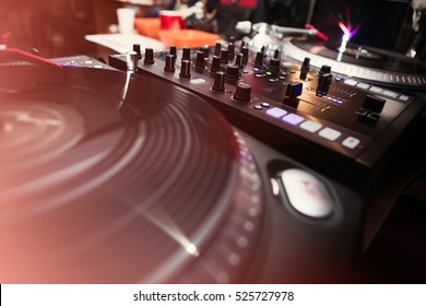 Vintage Dj Turntable & Sound Mixer.Mixing Controller,vinyl Record Player Setup.Audio Equipment For Party Disc Jockey.Play Music On Hip Hop Concert In Nightclub.Professional Djs Technology On Stage