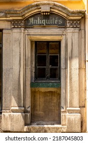 Vintage Door And Facade Of An Abandoned Antique Shop 