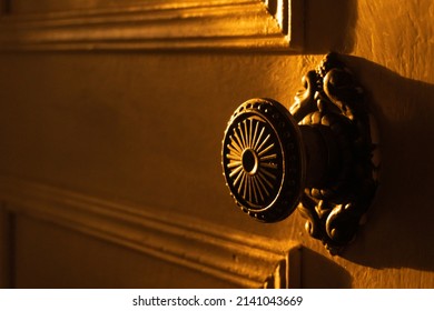 Vintage Doorknob. Close-up. Sun Rays.