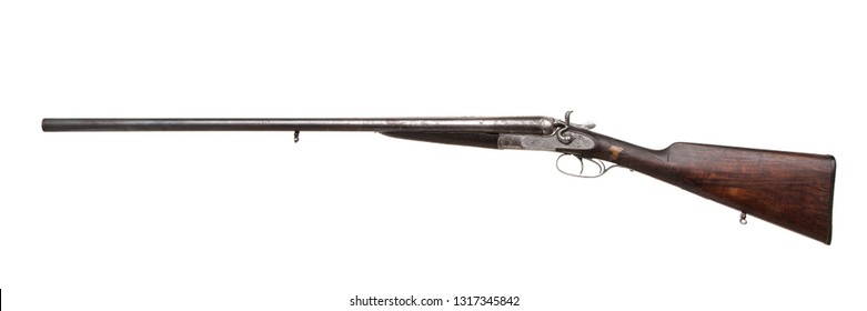 Vintage double-barreled hunting rifle isolated on a white background.