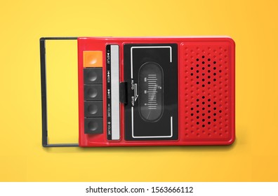 Vintage Electronic Alarm Clock With Flip Clock. Red Retro Digital Radio Alarm Clock. Antique. Retro Design From 60s 70s Home Interior. Bright Yellow Color. FM Alarm Clock.