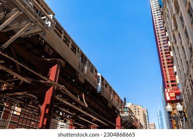 Vintage elevated loop train and track in downtown Chicago