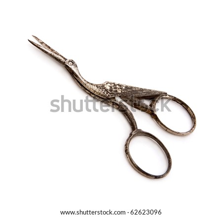 Vintage embroidery scissors in shape of stork, isolated on white background