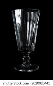 Vintage Empty Wineglass Isolated On Black Background