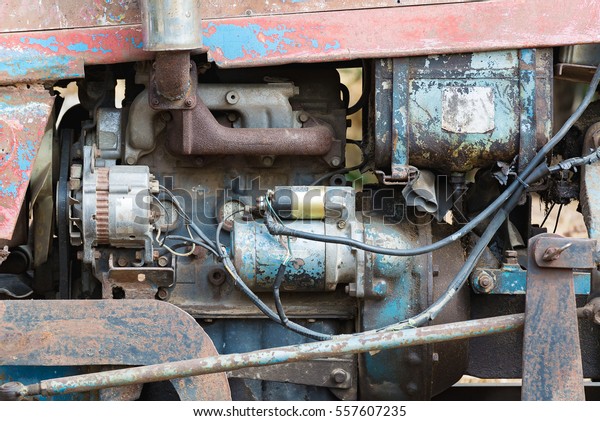 Vintage engine car system.\
Part of old diesel engine of heavy truck closeup grunge rusty and\
oil dirty.