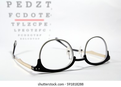 Vintage Eye Glasses On Eye Chart Exam,reading Glasses