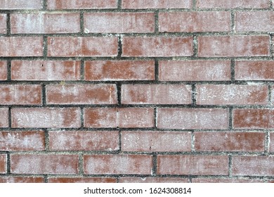 A Vintage Faded White Washed Red Brick Wall