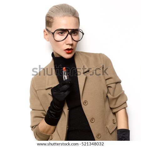 Vintage Fashion Blonde. Beige classic suit and stylish eyewear. Glam retro style trend Fall winter Stylish Accessories lipstick and Gloves