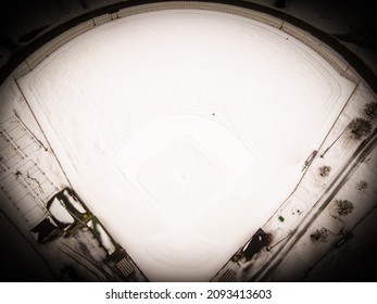 Vintage Feel Photograph From Above Of Snow Covered Baseball Field