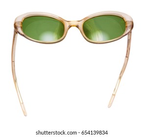 Vintage Female Tortoise Shell Sunglasses With Green Lenses. Isolated.