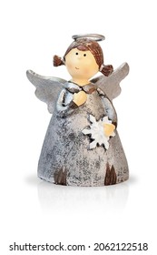 Vintage figurine of funny Christmas angel girl with snowflake. Isolated on white background.