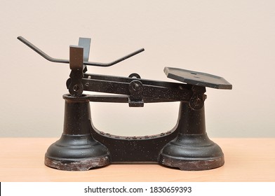 A Vintage Food Scale On A Table