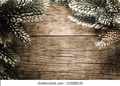 Vintage Frame From Branch Of Christmas Tree On Old Wood