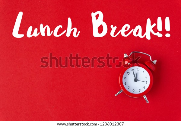 Vintage\
free time in office holiday hour red background concept alarm clock\
on work holiday, paper color in minimal style, take time template\
for break, break lunchtime at school for\
lunch.