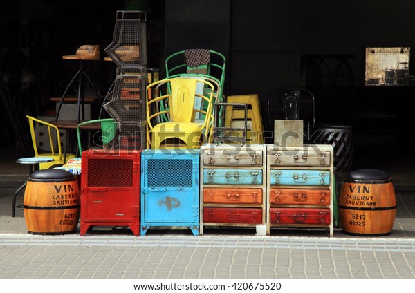 Vintage furniture and\
other staff at entry to shop at Jaffa flea market district in Tel\
Aviv-Jaffa, Israel.