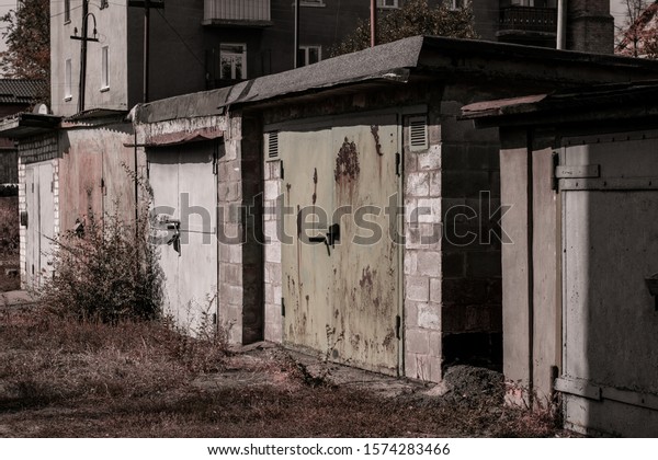 Vintage garages for cars. Rusty russian car\
garages. USSR garage\
complex