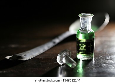 vintage glass bottle of poison