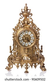 vintage gold clock with reflex on white