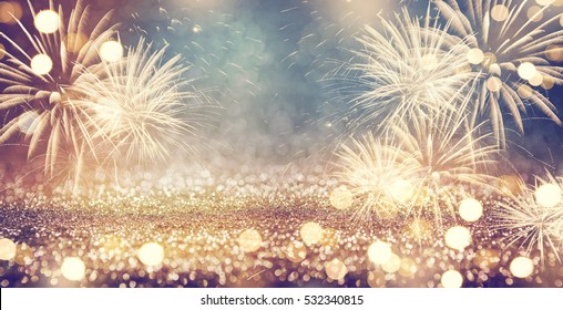Vintage gold and green Fireworks and bokeh in New Year eve and copy space. Abstract background holiday.