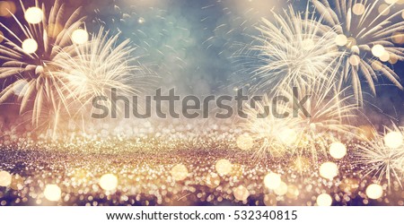 Vintage gold and green Fireworks and bokeh in New Year eve and copy space. Abstract background holiday.