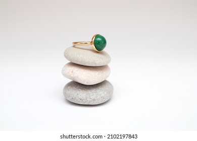 Vintage Gold Ring With Green Stone On Gray Pebbles