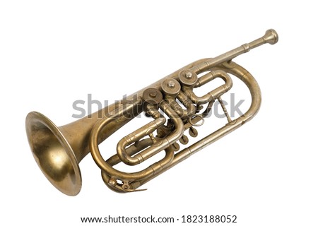 Vintage golden trumpet isolated on a white background
