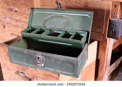 An Vintage Green Fishing Tackle Box