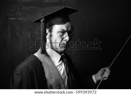 vintage headmaster with cane