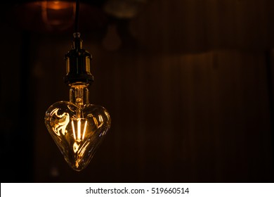 Vintage Heart Shape Light Bulb In Dark Tone.