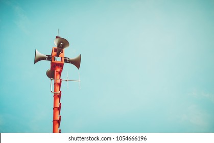 vintage horn speaker - public relations sign and symbol. vintage color tone effect - Shutterstock ID 1054666196
