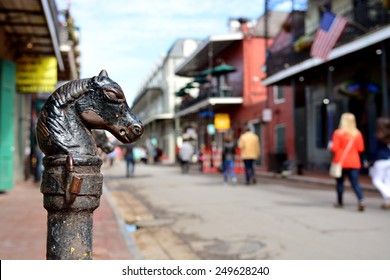 A Vintage Horse Head Hitching Post On Bourbon Street In The Historic New Orleans French Quarter With Shallow Depth Of Field.