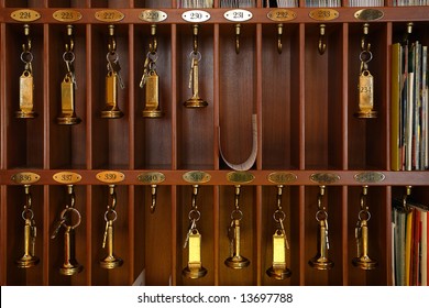 Vintage Hotel Front Desk Key Rack. Focus On The Top Row Of Keys.