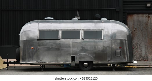 Vintage house on wheels of polished aluminum on the street of Manhattan. New York. USA