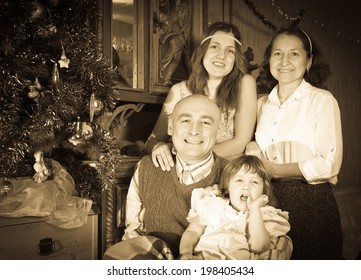 Vintage Image  Of Happy  Family Celebrating Christmas At Home