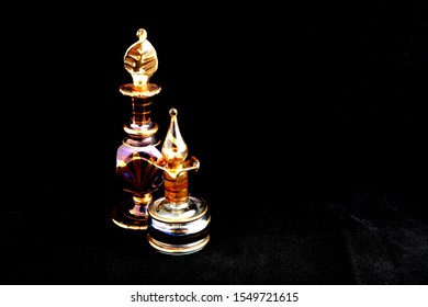 Vintage Iridescent Hand Blown Glass Perfume Bottle Daubers; Antique Blown Glass On A Black Background. 