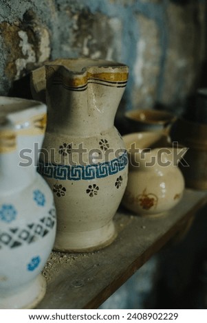 Vintage jars in a basement. Old jugs. Selective focus.