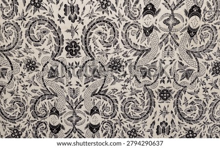 Vintage Javanese batik textile pattern in black and white. Traditional Asian cultural fabric background with seamless detailed floral and mythical animal illustrations.