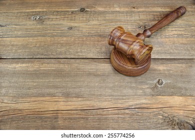 Vintage Judges Gavel On Grunge Wood Table