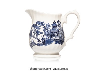 Vintage Jug. Old Antique Blue and White Willow Pattern Jug. Rustic Kitchenware Tableware Ceramic Milk Jug. Pastoral Country Style Blue and White Pot Pitcher for Cream. Pen Tooled Clipping Path in JPEG
