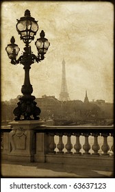 Vintage lamppost on the bridge of Alexandre III in Paris, France