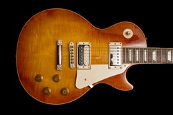 Vintage Les Paul Guitar With A Honeyburst Finish