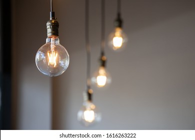 vintage light bulb hanging from ceiling for decoration in living room. - Powered by Shutterstock